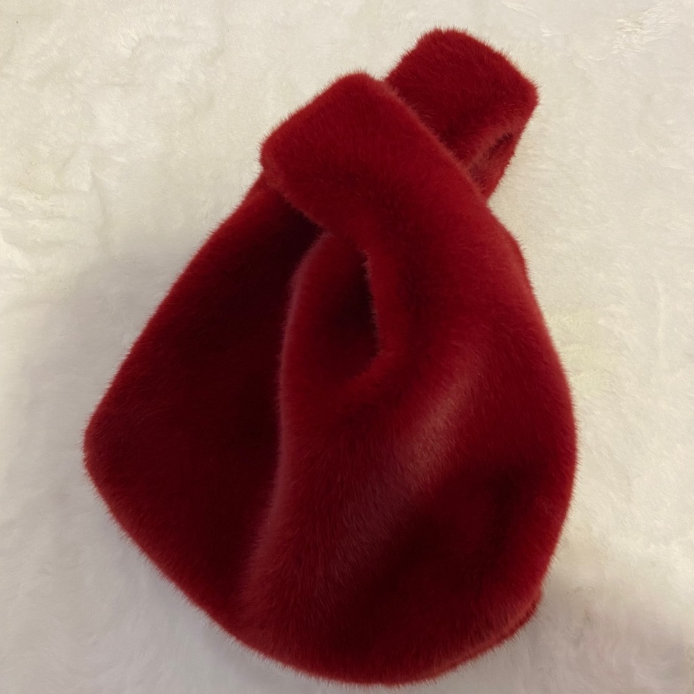 Faux rabbit hand bag